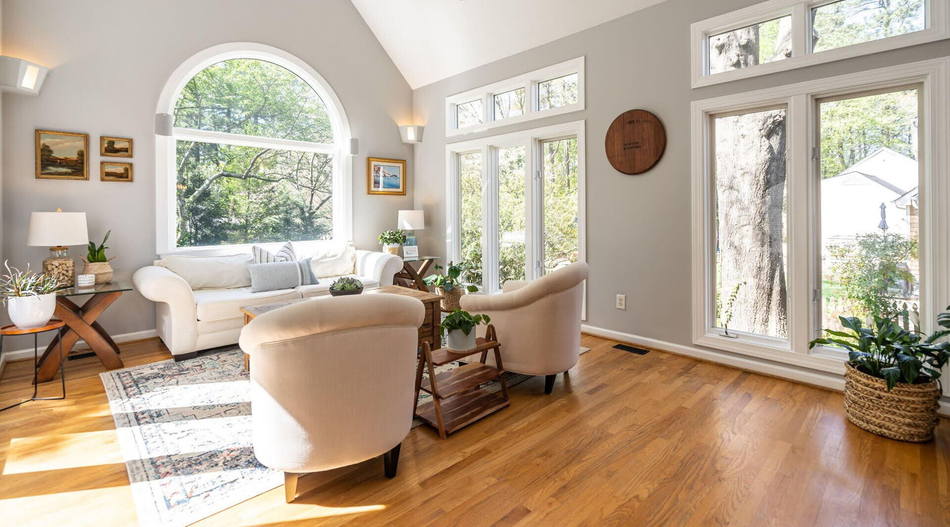 This project made a splash without a large budget. Simple changes, big difference: fresh paint, warm brass, and natural wood details that make this porch feel like home again.