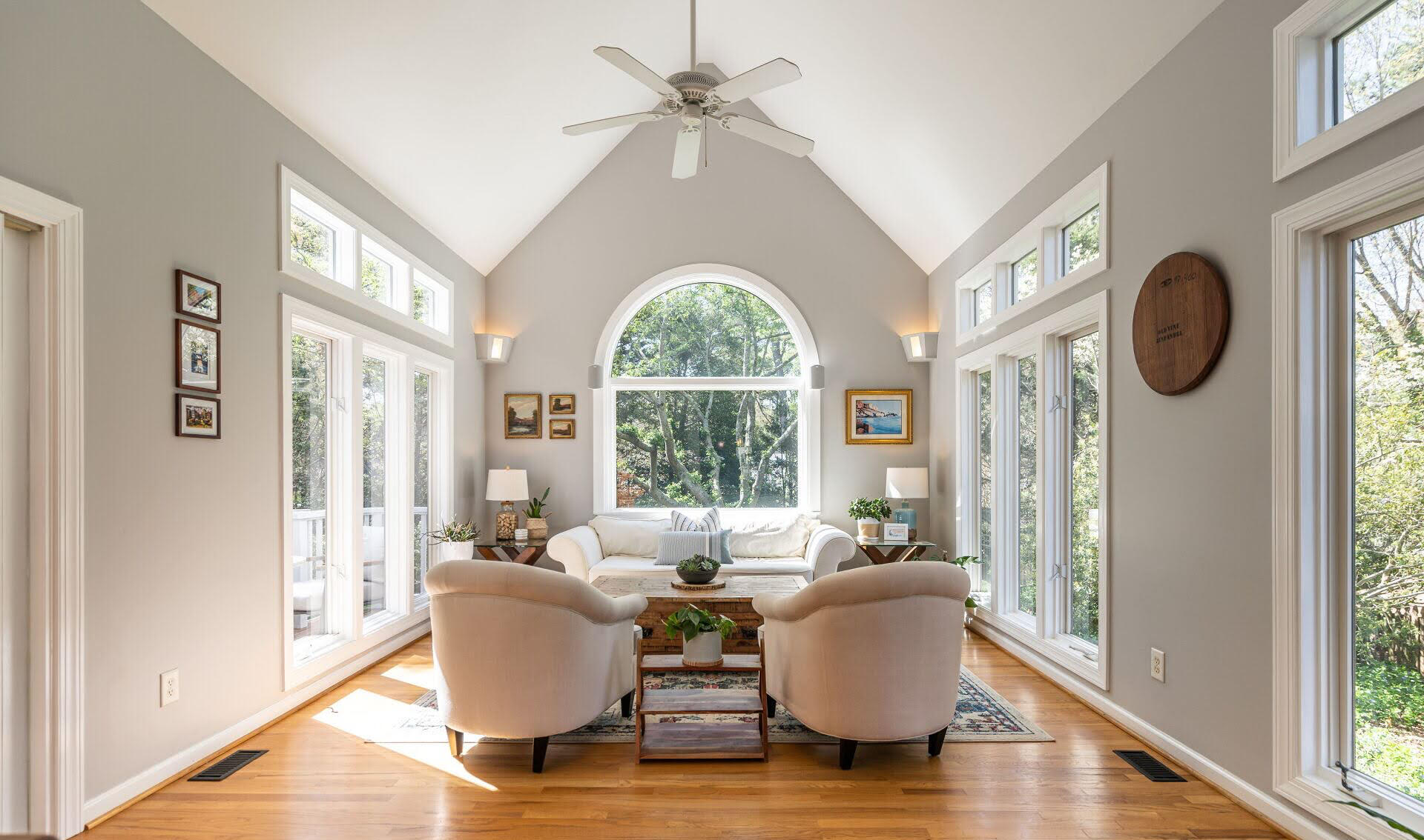 The client&#39;s goal was classic curb appeal with warmth and character. The Unstuck solution was navy siding, bright white trim, brass details, and natural wood for balance.